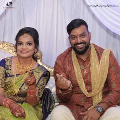 A fun and cute moment from an engagement ceremony. The couple's playful gesture adds a personal touch to their photos, showing their excitement for the journey ahead.