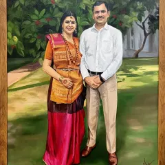A full-length portrait of a couple, hand-painted on a 24x30 inch canvas. I worked to capture their elegant poses and the beautiful details of their traditional attire against a soft, natural background.