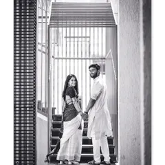 A stylish black and white anniversary shoot on a modern staircase. We love celebrating your milestones with you, creating timeless portraits long after the wedding day.