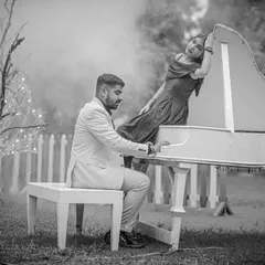 Another angle of the musical fairytale. The black and white treatment enhances the smoky, ethereal quality of the scene, focusing on the romance of the moment.