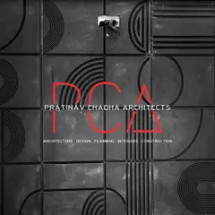 The Pratinav Chadha Architects logo set against a dark, textured wall panel. This image reflects the sophisticated and tactile nature of my design work.