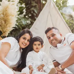 A beautiful family portrait taken outdoors with a fun teepee setup. I love creating relaxed environments where families can just be themselves.