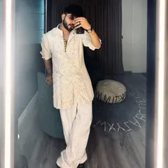A full-length mirror shot of the SoMan Menswear look. The kurta shirt is versatile enough for festive occasions or a smart casual event.