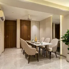 Subtle elegance meets functionality in this sophisticated dining space. A warm neutral palette, quilted textures, and gold accents come together to create a setting that’s both inviting and refined, perfect for effortless hosting and everyday luxe.