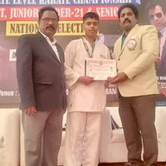 One of our cadet champions receiving his certificate and medal at the state championship.