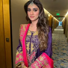 Another angle of this festive Karwachauth look, showing the beautiful soft waves and the way the makeup enhances her features.