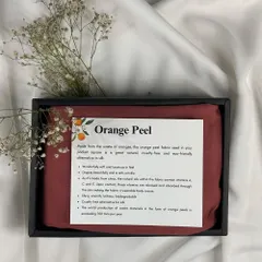 A gift that tells a story of sustainability. This set features a pocket square made from innovative 'orange peel' fabric, a cruelty-free and eco-friendly alternative to silk that is wonderfully soft and luxurious to the touch.