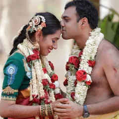 An intimate and tender moment between the couple during their wedding ceremony. These quiet, emotional exchanges are just as important as the grand rituals.