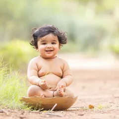 The beauty of simplicity. Using natural props and settings allows your baby's joyful personality to be the star of the photograph.