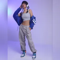 This is my take on K-pop inspired streetwear. The look combines layered casuals like a crop top and cargo pants with a bold jacket and high-top sneakers, creating a complete outfit that feels authentic to the genre and ready for an e-commerce lookbook.