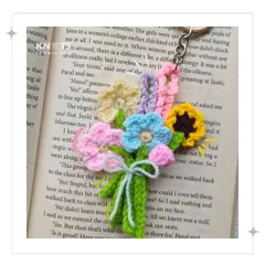 A tiny crochet bouquet that doubles as a keychain! It's a miniature version of my larger bouquets.