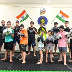A serious moment with the team. Everyone is focused and ready to learn, showing the discipline and respect that is central to our training philosophy.