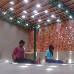 Practicing Dandasana (Staff Pose) in our beautiful rooftop studio. The light filtering through the ceiling creates a magical atmosphere for our Ashtanga Vinyasa and Pranayama classes.