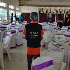 One of our team members at Star Convention Hall, wearing the Plaza Caterers uniform. Our staff is trained to be professional, hygienic, and helpful throughout your event.