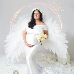 For the mom-to-be who wants something truly unique, we created this "Angel Wings" concept. This themed studio setup turns your maternity portrait into a piece of art, celebrating the angelic feeling of creating life.