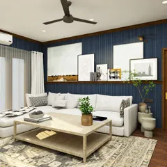 Moody blue vibes create a classy den in this farmhouse-style home. The dark paneled walls, large white sofa, and curated gallery wall make it a stylish and comfortable room to relax and watch movies.