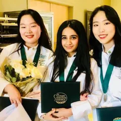 A photo from my graduation at the Culinary Institute of America with my friends. This is where my professional journey began.