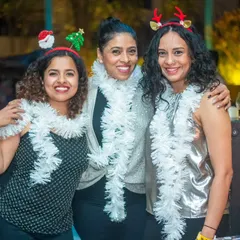 Christmas cheer with the La Rumba crew! Themed nights are always a great excuse for fun group photos and festive accessories.