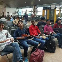 Our team waiting at the airport for a flight to our next show. We travel together as a troupe to perform all over the country.