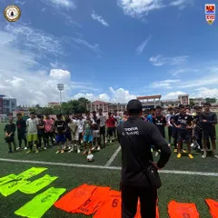 Our coach addressing a large group of aspiring footballers during our trials in Tripura. We are searching for the next generation of Indian football stars.
