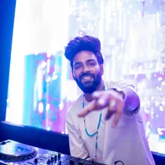 Interacting with the crowd at SinQ Nightclub. A great set is a conversation, and my job is to keep the energy flowing back and forth between the booth and the dance floor.