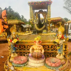 This Ratha Gadi features a seated Ganesha playing a drum, an elephant, and other deities, all part of a grand procession.