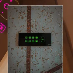 Here is the same model of smart panel, but with all green icons. The color of the backlighting is completely customizable to match the room's color scheme or the client's preference.