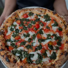 No frills, just flavour. Our Spinach & Garlic pizza with fresh cherry tomatoes is simple, bold, and ridiculously good.