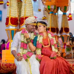 A sweet, candid interaction between the bride and groom during their South Indian wedding ceremony. These are the moments that tell your unique love story.