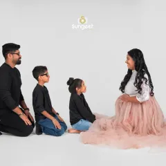 A new chapter is beginning. We captured this beautiful family of four, eagerly awaiting their newest member. Our family portraits are all about the love and connection that binds you together.