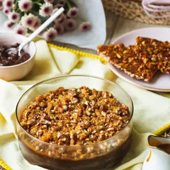 A full view of our Chocolate Salted Caramel Trifle, showcasing the generous topping of crunchy almond praline. This dessert is a perfect balance of rich, sweet, and salty flavours.