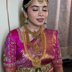 A close-up of the soft glam eye makeup and flawless base. This look is a perfect example of enhancing natural beauty for a timeless bridal portrait.