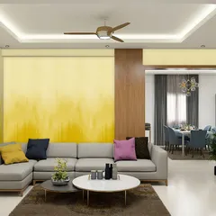 This yellow ombre design has a textured, brushstroke effect, adding an artistic and dynamic feel to the living space. It pairs beautifully with the neutral sofa and colorful cushions.