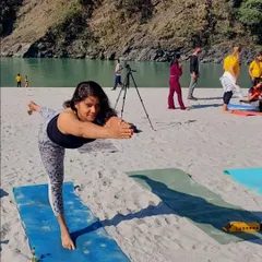Holding Warrior III on the beach. Balancing poses like this are a physical and mental challenge, teaching you to ground yourself and focus on a single point to avoid distractions.