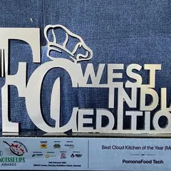 A close-up of the 'Best Cloud Kitchen of the Year' trophy from the FC West India Edition awards. This award is a symbol of my dedication to culinary excellence.