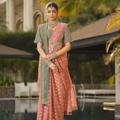 Another angle of the beautiful Jayanti Reddy saree, showcasing the delicate embroidery and the perfect poolside setting.