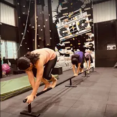 Our graffiti-style boombox mural provides a high-energy backdrop for the training area at Street Gym. The black and white design adds a raw, urban feel that fits the gym's atmosphere.
