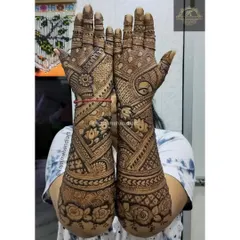 A beautiful and intricate design for the groom's sister. I love creating customized looks for the family that make them feel just as special as the bride and groom.