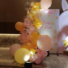 A detailed shot of the balloon work for the bunny-themed shower. We use a mix of sizes and shades, including translucent bubble balloons, to add depth and texture to our arrangements.