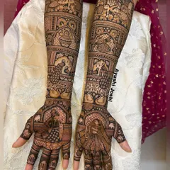 Grandeur in every detail. This bridal mehendi showcases the Varmala ceremony, surrounded by majestic elephants, graceful peacocks, swans, and royal palace windows.