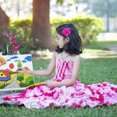 Letting a child's imagination run free is pure magic. For my creative sessions, I bring along props like easels and paints to capture your little artist as they create their own masterpiece in the park.