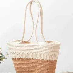 A clean, studio-style shot of my two-tone jute and cotton rope tote bag. This view highlights its elegant shape and the sturdy, comfortable rope handles, perfect for carrying all day.