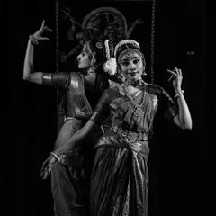 A black and white artistic shot of our Ardhanareeshwara duet. This pose represents the confluence of two energies into one, a central theme of the choreography.
