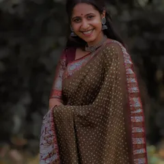 Dressed in a traditional saree for a cousin's wedding. These events are filled with fun, food, and of course, lots of music and memories.