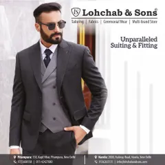 Beyond ethnic wear, we bring the same precision to western formals. This classic three-piece charcoal suit is an example of our bespoke tailoring service, where we ensure an unparalleled fit for a sharp, professional look.