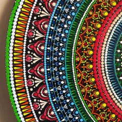A close-up angle of the 24-inch beauty, showing the texture and precision of the dotting technique. You can see how the colors blend and transition through the layers.