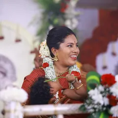 A candid, heartwarming moment between a mother and her child during the naming ceremony. These are the precious memories I strive to create the perfect backdrop for.