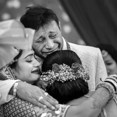 This is the real stuff. The truest stories are not in the smiles for the camera, but in the quiet tears and tight hugs. This moment, a father's emotional embrace, is a testament to the powerful, unseen threads of family that I strive to capture.