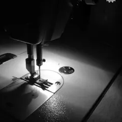 In the quiet focus of our workshop, every stitch is made with intent. This is where the magic happens, as fabric is transformed into fashion.