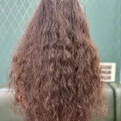 The "before" shot. This shows the client's naturally frizzy and undefined long hair before we worked our magic.